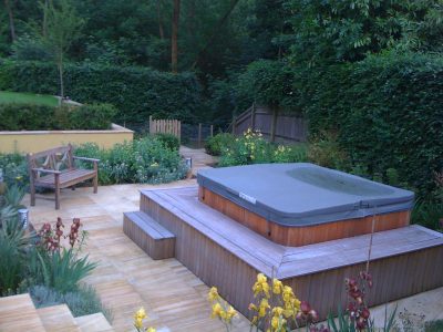 The sunken hot tub garden, the yew hedges are still to reach their mature height.