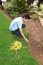  marking out the edge of a flower bed