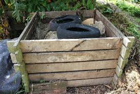 Covering the compost with an old carpet or similar.